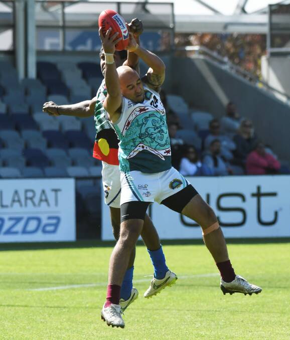 STRONG CATCH: Joel Campbell  (Swan Hill Murray Cods) claims a mark at what was last year known as the NAIDOC football and netball carnival in Ballarat. 