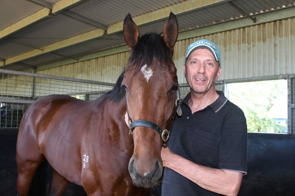 Nigel Blackiston with Translator at his Ballarat stable. Picture: Lachlan Bence
