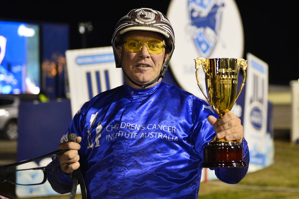 KIWI POWER: Leading reinsman Anthony Butt with his hands on the Ballarat Pacing Cup in 2017 - the year he won on the Mark Purdon-trained Smolda.