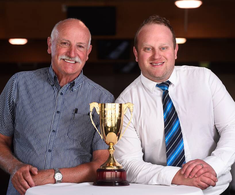 HOPING: Bruce Edward and his son Leigh with eyes on the Ballarat Pacing Cup trophy. Picture: Adam Trafford