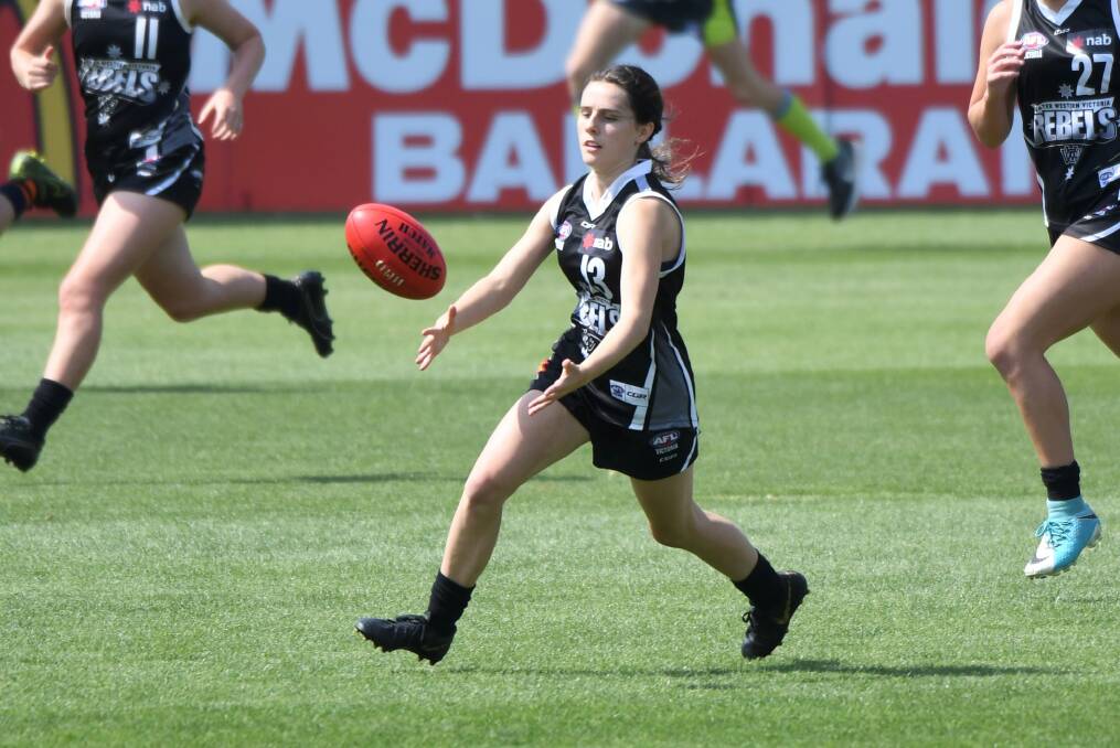 ON HER OWN: Lake Wendouree's Brook Thompson finds some space as chases down the football for GWV Rebels at Mars Stadium. Picture: Lachlan Bence