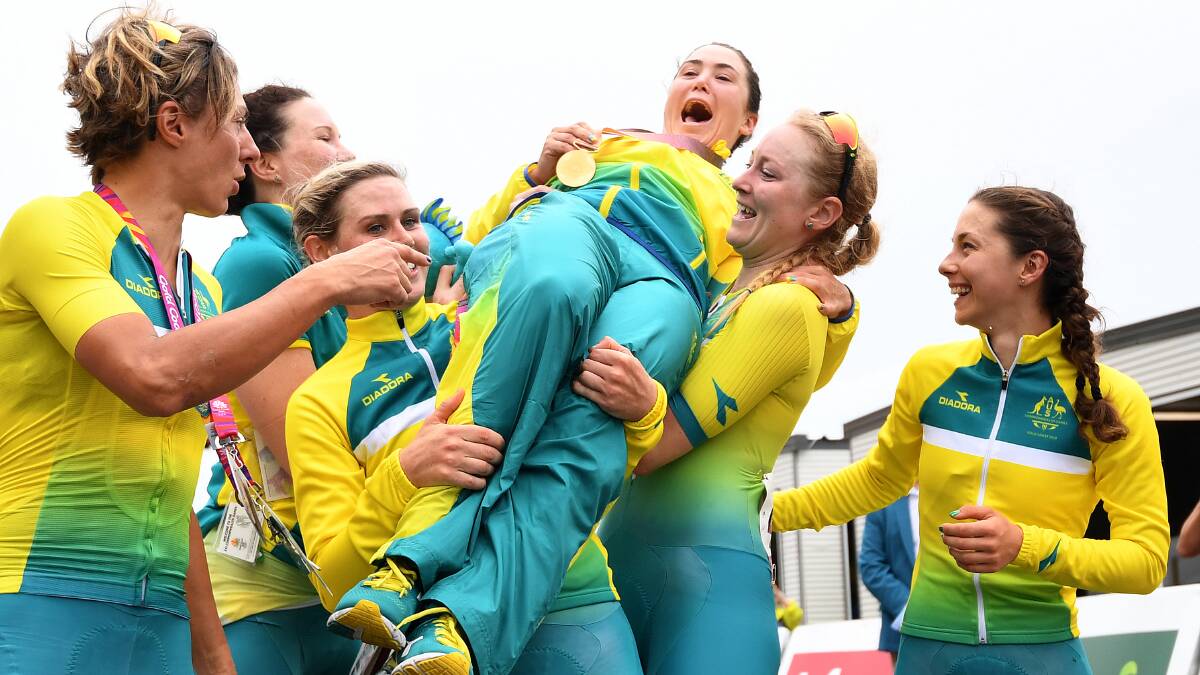 EXCITEMENT: Shannon Malseed, right, joins teammates in celebrating Chloe Hosking's gold medal. Picture: AAP Images