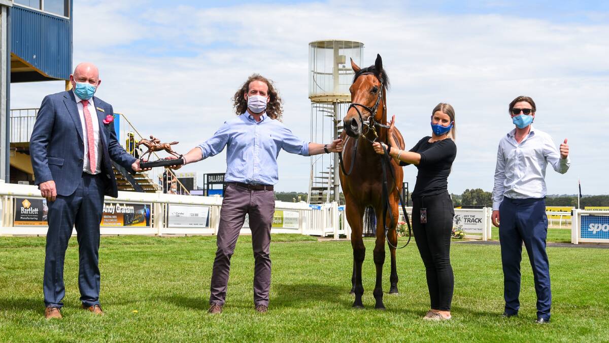 BTC president Brad Fisher with co- trainers Ciaron Maher and David Eustace and Snapdancer. Picture: Natasha Morello/Racing Photos