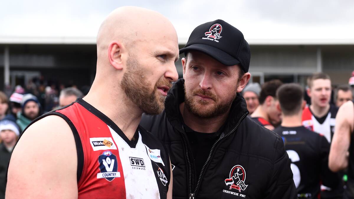 Paul Borchers chats with Gary Ablett on a massive day for Creswick this season. Picture by Adam Trafford.
