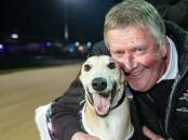 Cape Clear breeder-owner-trainer Gary Peach with Pink Diamond Shoure Course final winner Silver Brute. Pitcire: Greyhound Racing Victoria