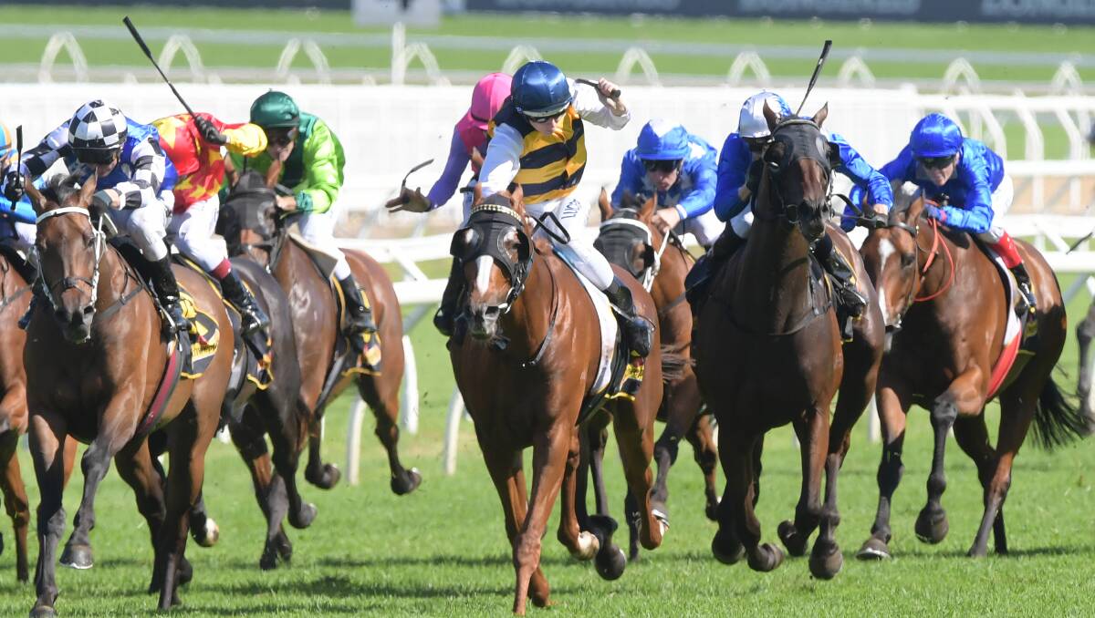 CUP BOUND: Gallic Chieftain (Damian Lane) in charge in the group 2 $300,000 Chairman's Handicap, 2600m, at Royal Randwick. Picture: AAP Images
