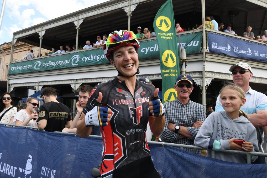 TWO IN A ROW: Geelong's Rebecca Wiasak gives the thumb up after her second consecutive elite women's criterium champion. Picture: Lachlan Bence  