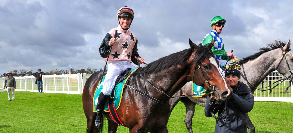 ONE DOWN: It's a thumbs up from Ballarat apprentice jockey Will Price after the first of his first four wins at Donald. Picture: Getty Images