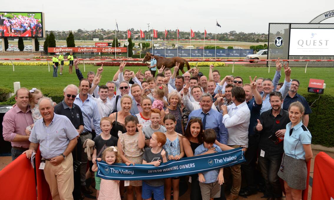FANS: Members of the Heart Of Puissance ownership group after the colt's win at Moonee Valley in the spring. Picture: Getty Images