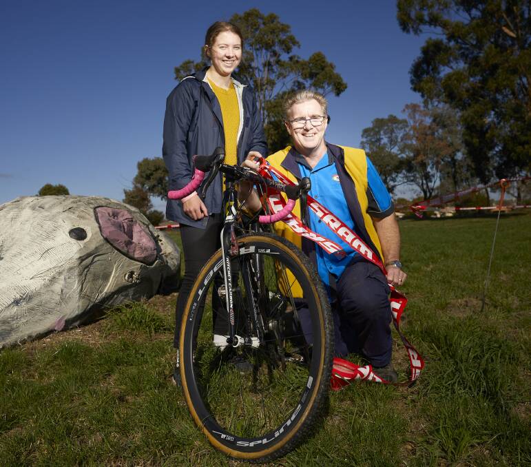 READY, SET, GO: Ballarat cyclocross racer and volunteer Nina Kerr with acting race director Chris Liston on course at Ballarat Pony Club.   