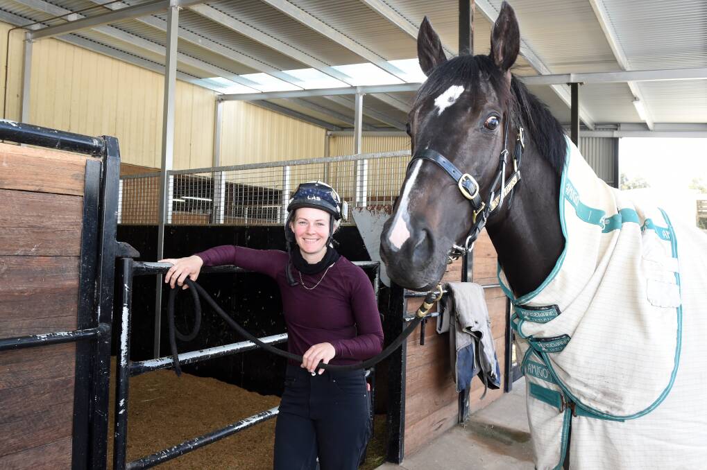 ALL SET: Trackrider Nikki White with Melbourne Cup runner Persan at the Ballarat stable of Ciaron Maher and David Eustace. Picture: Kate Healy