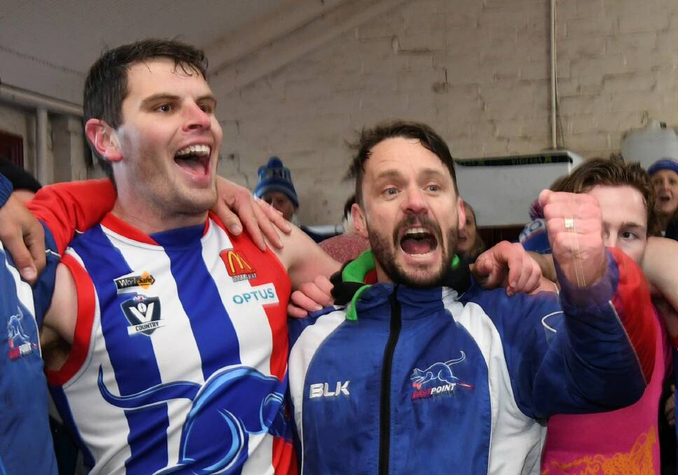 RAPT: Brad Whittaker and coach Jake Bridges belt out the East Point song in post-match celebrations.