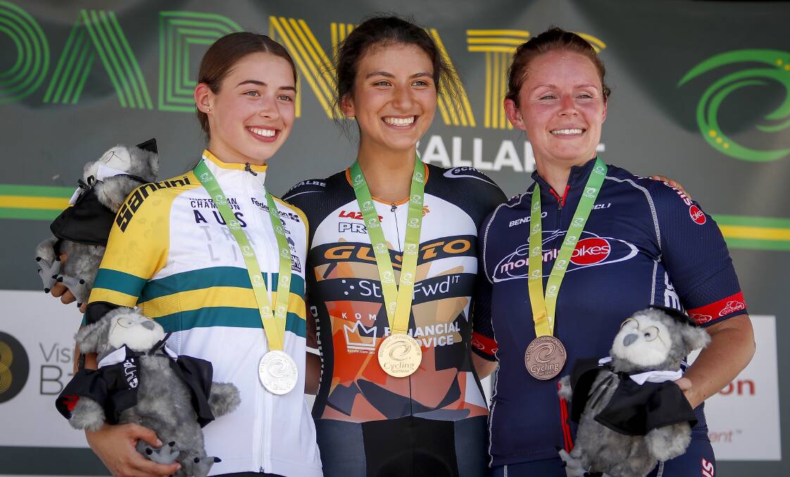 TOPS: Catalina Soto (Brunswick) flanked by Elizabeth Nuspan (Brunswick) and Emma Jackson (Castlemaine) on the women's fixed gear criterium podium. 