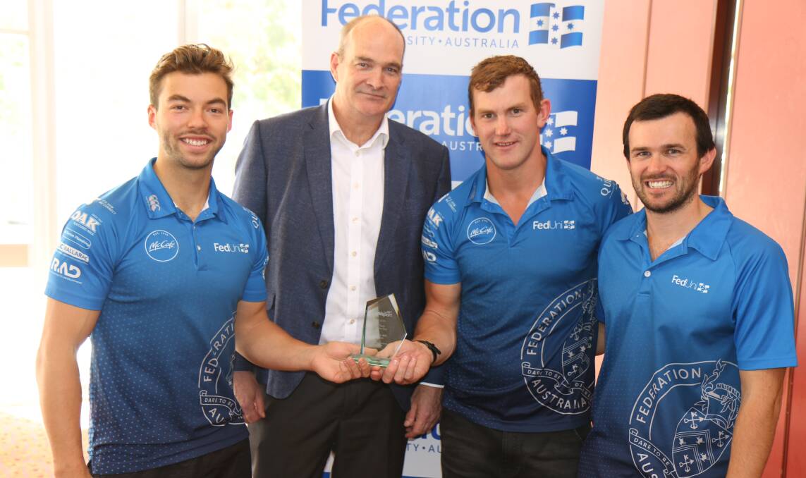UniSport Australia chief executive officer Mark Sinderberry, FedUni Australian rules team coach Hayden Walters, captain Casey Egan and FedUni sport and clubs co-ordinator Jason Slater.