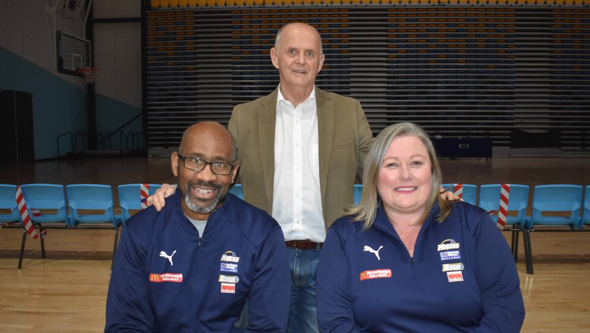 STILL ON BOARD: Basketball Ballarat chief executive officer Peter Eddy with reappointed Ballarat Rush head coach Eric Hayes and assistant Megan Collins.