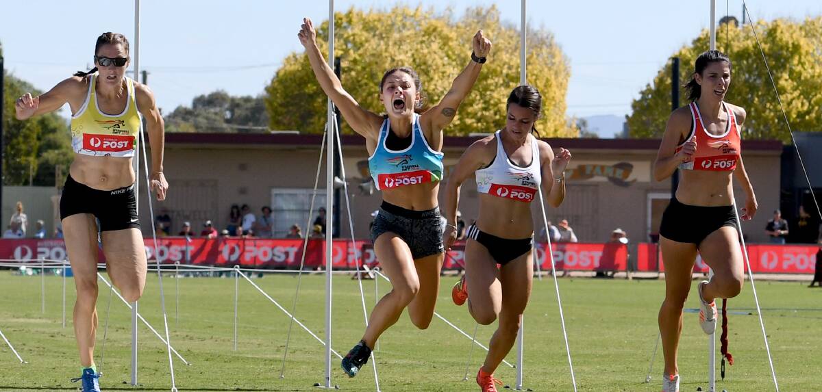 CELEBRATION TIME: Elizabeth "EJ" Forsyth jumps for joy after crossing the line to capture the Stawell Women's Gift. Pictures: Samantha Camarri 