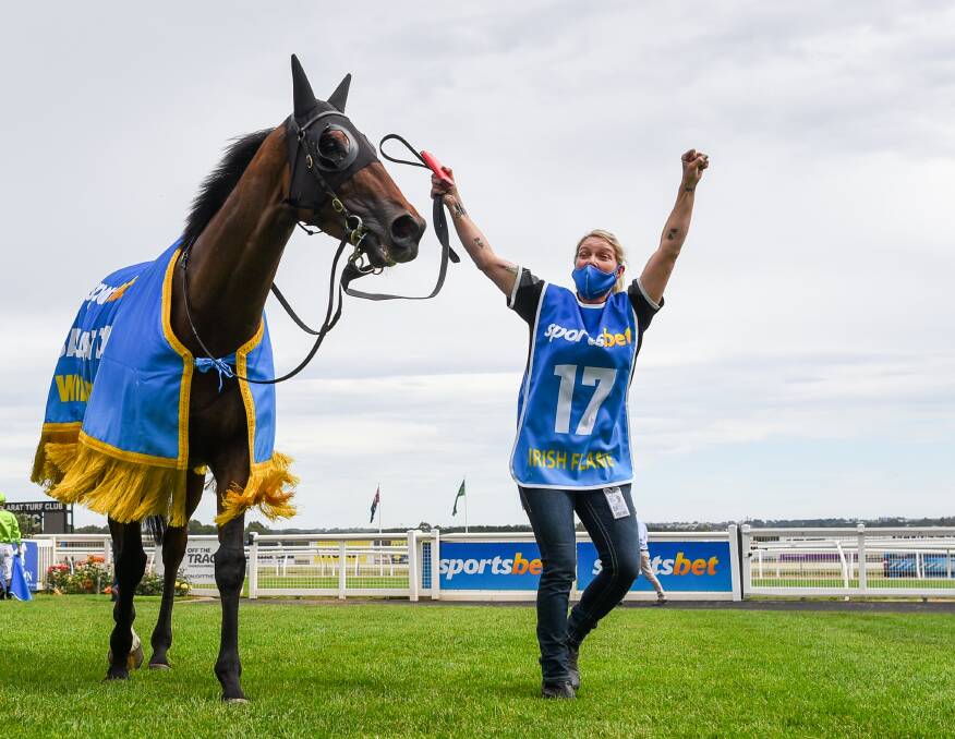 THRILLED: Strapper Kylie Scott celebrates the Ballarat Cup victory
with Irish Flame. Picture: Natasha Morello/Racing Photos