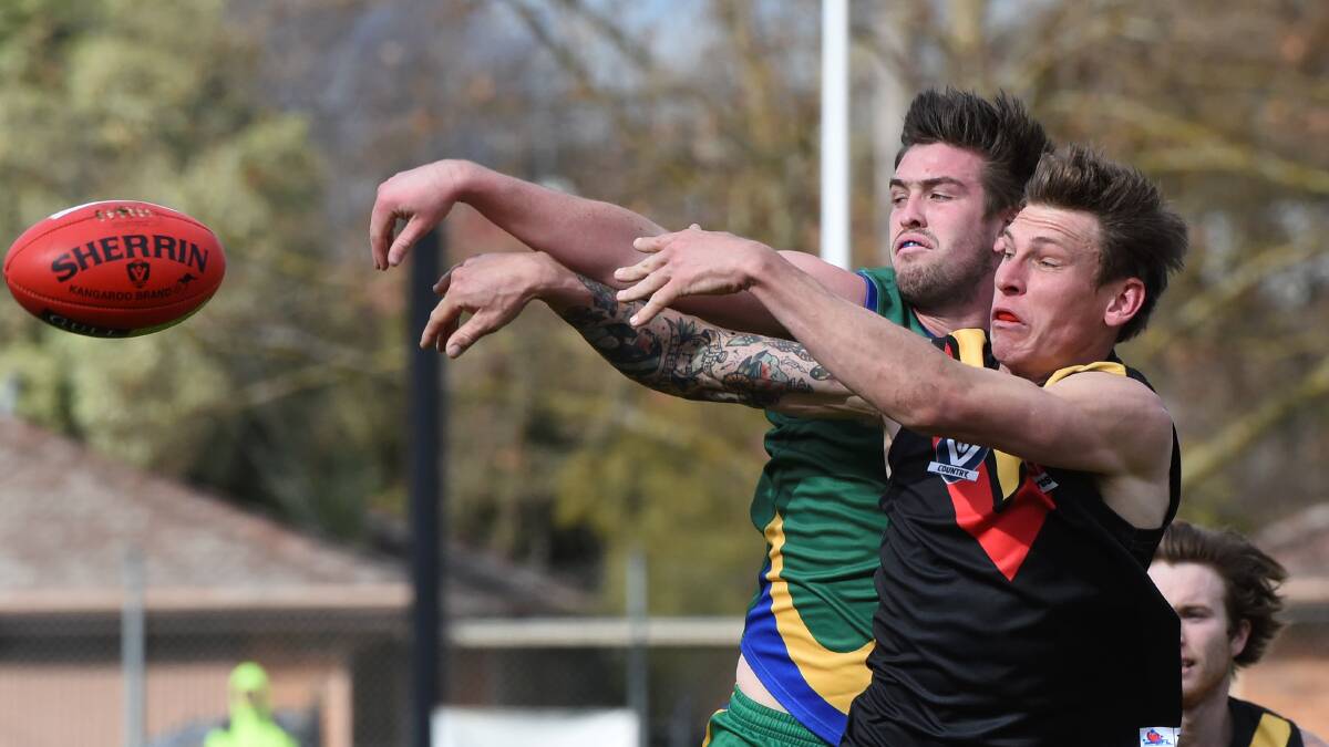 Key forward Jack Elkington, pictured in battle with Bacchus Marsh's Rhys McNay last year, is back for Lake Wendouree to take on the Cobras again after missing a week with injury.