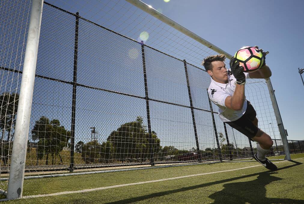 FULL STRETCH: Josh Dorron gets in some practice at Morshead Park. Picture: Dylan Burns