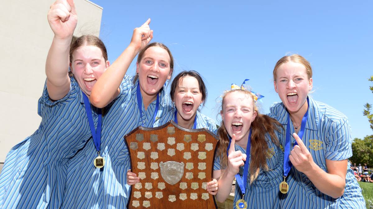 Loreto College's open division one crew of Casey Dodd, Isabella Prendergast, cox Aisling Love, Stephanie Jones and Libby Hutt celebrate the head of the lake victory and the regatta's aggregate. Picture: Kate Healy