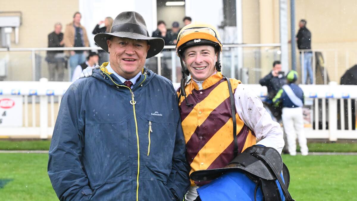 Tony McEvoy with Harry Coffey after Give Giggles won the A Grade Sheds BM70 Handicap to complete a treble for them. Picture by Reg Ryan/Racing Photos.