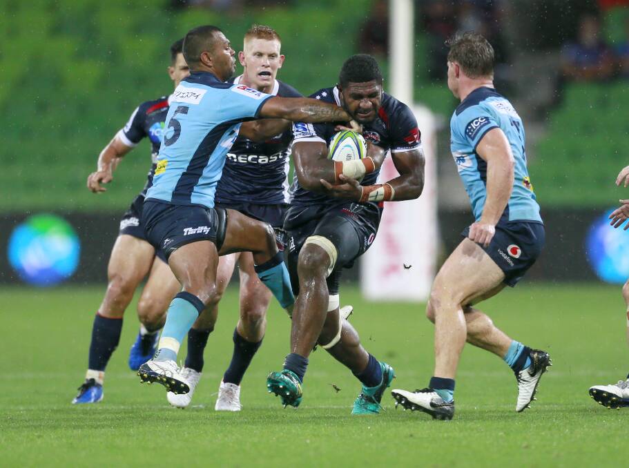 CRUNCH: Isi Naisarani powers his way through the Waratahs defence in the Rebels' first win of the Super Rugby season. Picture: Rebels Media 