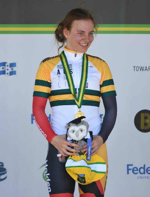 TOP OF PODIUM: Sarah Gigante with the spoils of capturing the national under-19 women's criterium title in Sturt Street, Ballarat. Picture: Lachlan Bence