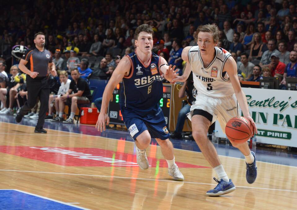 BIG STAGE: Sam Short pushes down the court for Melbourne United in his NBL debut. Picture: AAP Image