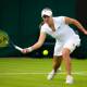 BIG TIME: Zoe Hives plays a low forehand at Wimbledon. Picture; Getty Images