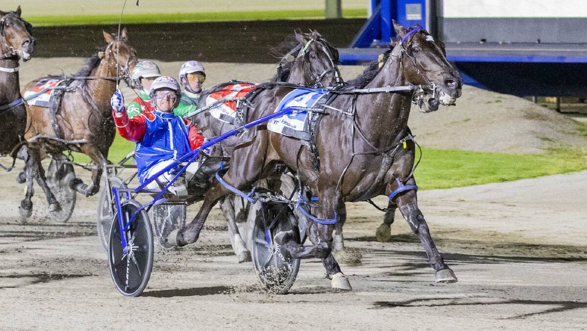 Michael Stanley gives the victory salute on Rock N Roll Doo in last year's Victoria Cup at Melton - a scenario he is hoping to repeat. Picture by Stuart McCormick/HRV.