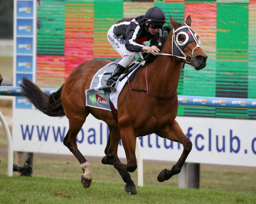 Jockey Michael Poy rides Jungle Edge to victory No Fuss Event Hire Tonks Plate. Pixcture: AAP Images