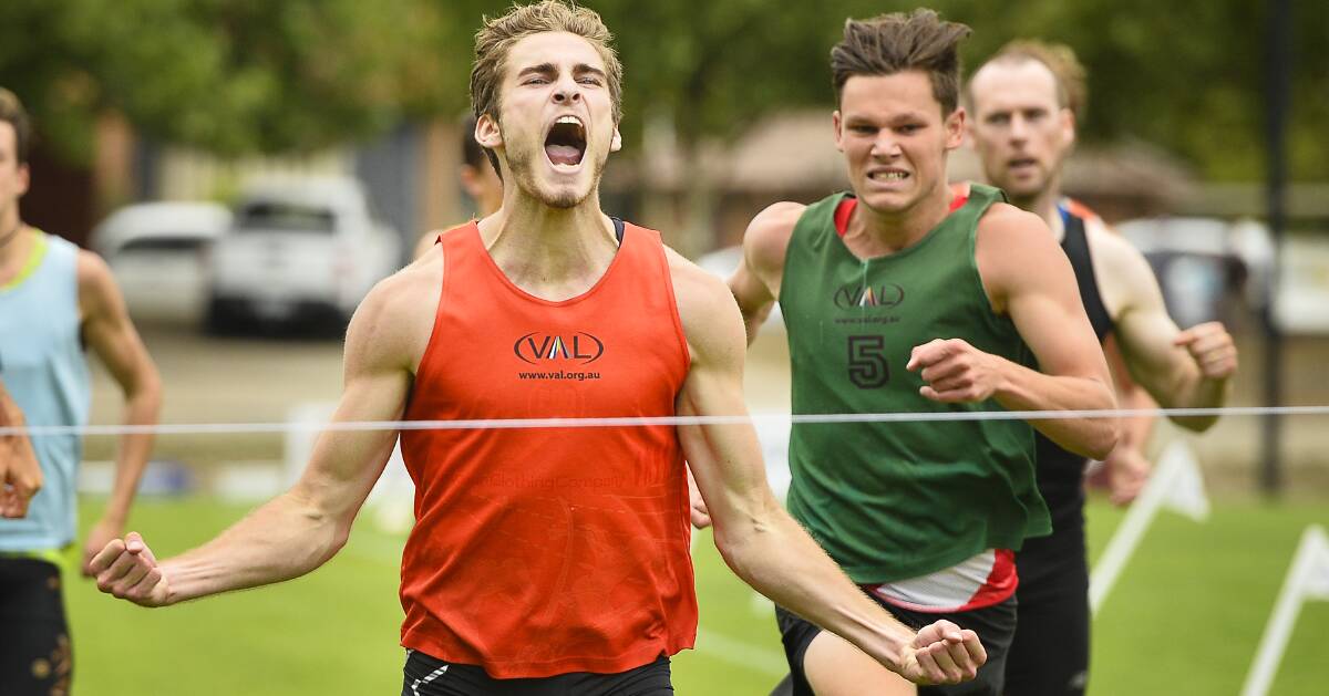 EXCITEMENT: Liam Procaccino gives out a loud shout for joy as he hits the line in the backmarkers' 400m. Picture: Dylan Burns