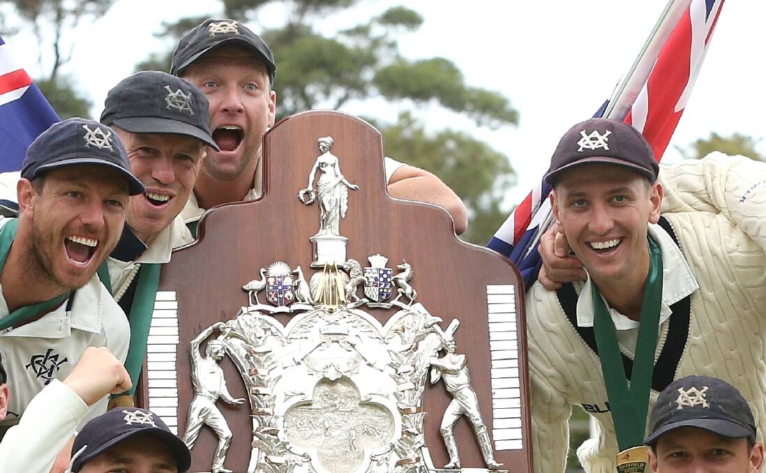 TITLE TIME: Matt Short, right, celebrates the Sheffield Shield win with James Pattinson, Peter Siddle and Cameron White. Picture: AAP Images
