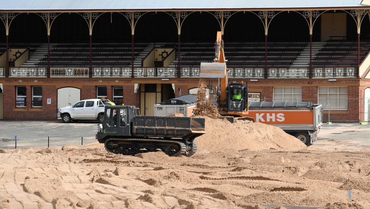 REDEVELOPMENT: a sand layer is spread across the City Oval surface on Thursday as the refurbishment continues. Picture: Lachlan Bence