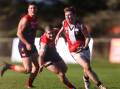 Creswick's Max Phillips gets away from Lachie Thornton from Bungaree at Bunagree on Saturday. Picture: Luke Hemer.