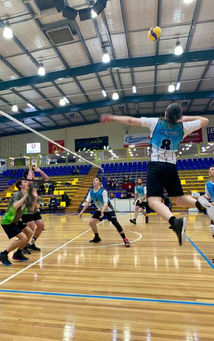 BIG HIT: Tom Murnane hits a winner from a setting by Ben Hassell. Picture: Volleyball Ballarat