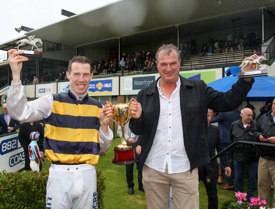 THE BIG ONE: Darren Weir and John Allen celebrate the Warrnambool Cup win with the OTI Racing-owned Gallic Chieftain. Picture: Rob Gunstone