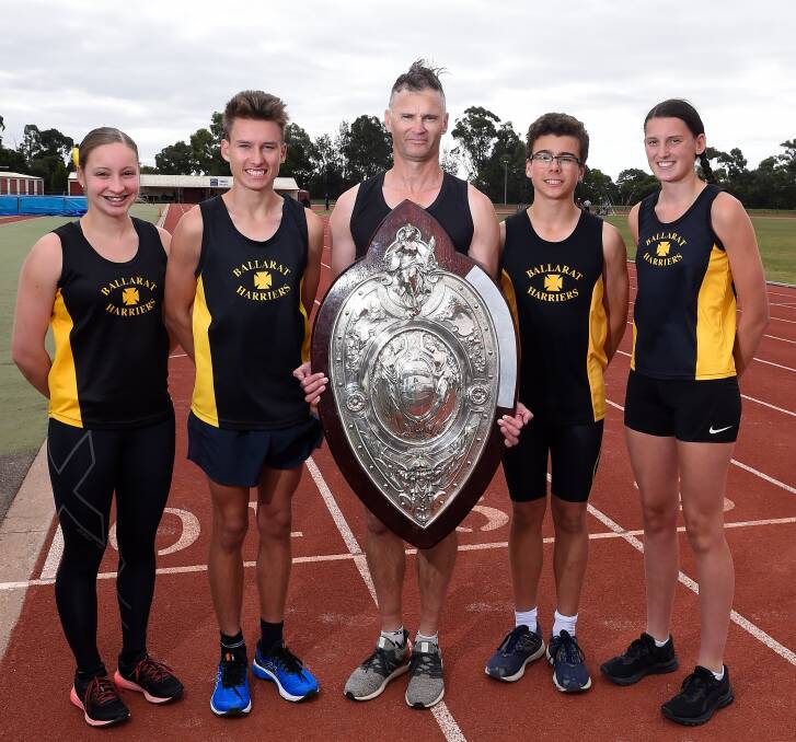 BIG PRIZE: Ballarat Harriers' Lavinia Male, Cooper Sherman, Conrad Oberholzer, Ryan Hovey and Angie Selkirk with the Loulgen Shield. Picture: Adam Trafford
