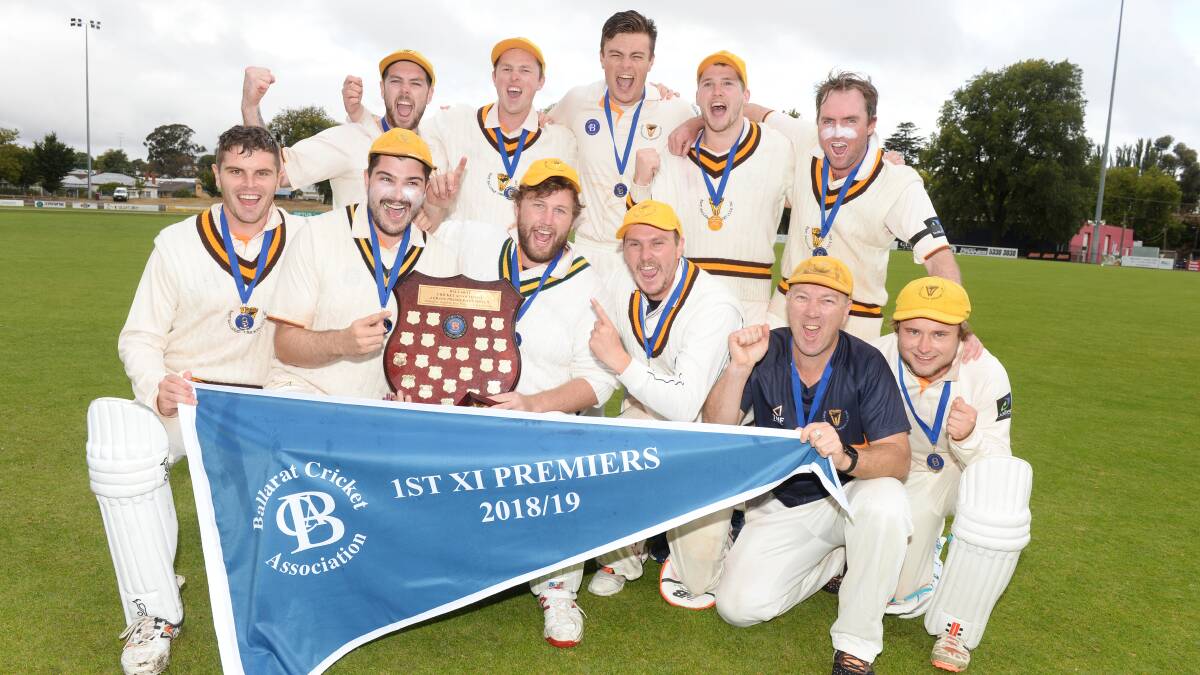 CELEBRATION TIME: East Ballarat with the BCA firsts premiership pennant. Picture: Kate Healy