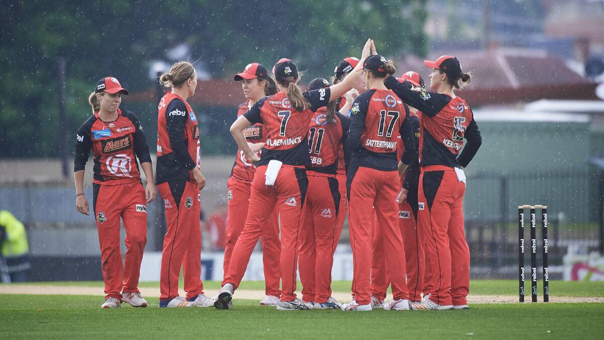 The Melbourne Renegades celebrate a wicket at Eastern Oval. 