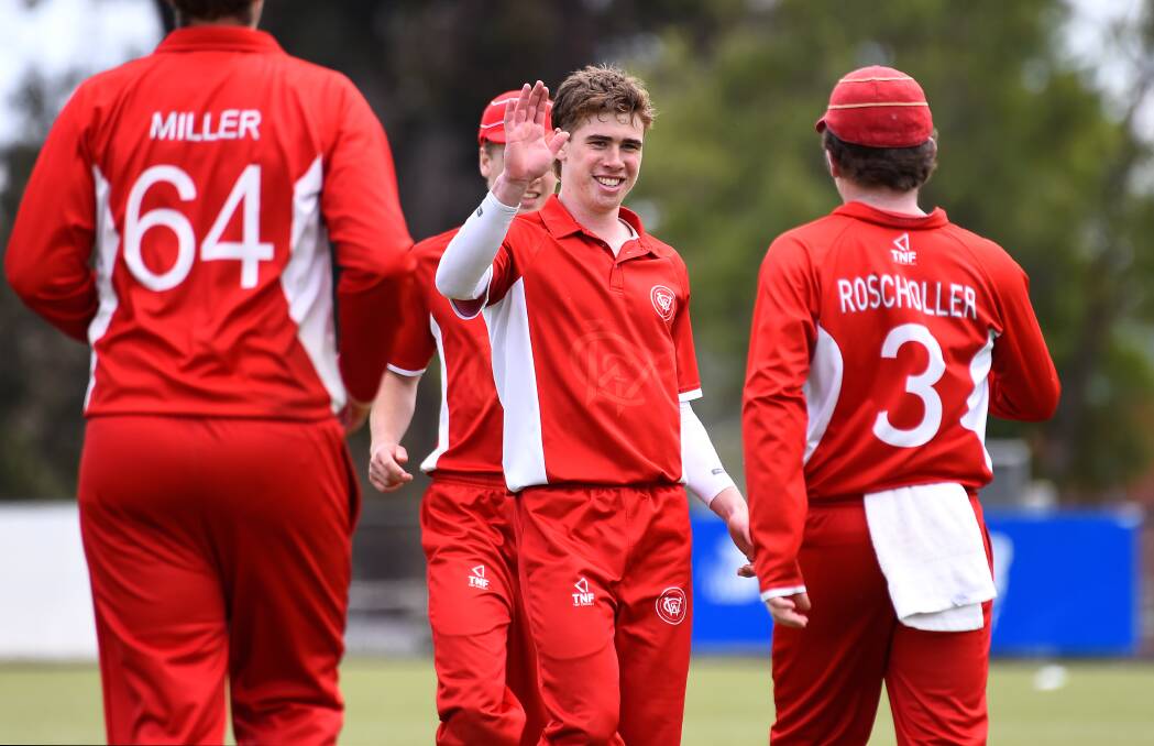 Wendouree all-rounder Tristan Maple, middle, celebrates a wicket with teammates last season. Picture by Adam Trafford.