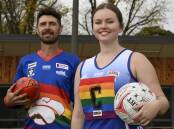 SUPPORT: Rob Rodgers and Brooke Cowan model Daylesford's pride jumpers. Picture: Lachlan Bence