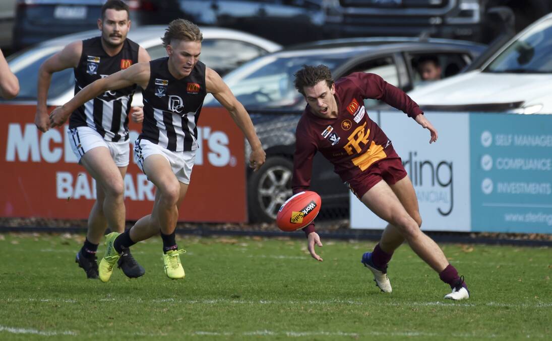 Darley's Mitch Ward hunts down Redan forward Lachlan McLean. Picture: Lachlan Bence