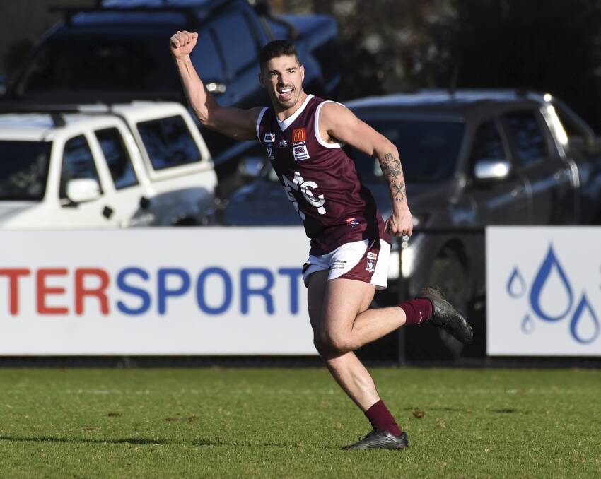 Jaycob Hickey celebrates a goal for Melton. Picture: Lachlan Bence