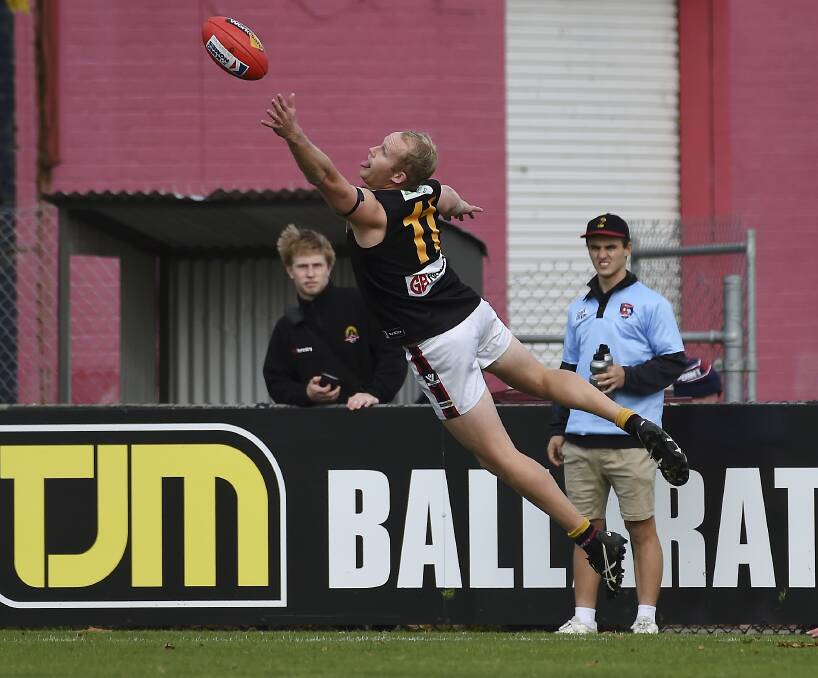 Bacchus Marsh captain Jake Owen tries to reel in the ball. Picture: Lachlan Bence