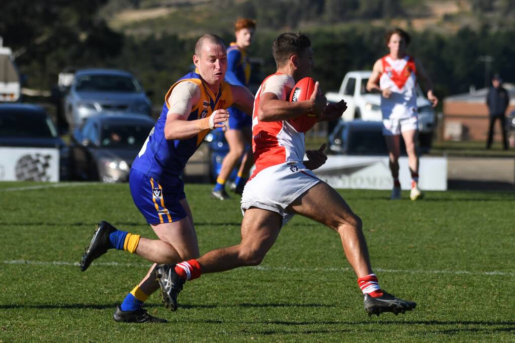 Cassidy tried to drag in Ballarat's Lachy Dawson during the 2021 season. Picture: Kate Healy