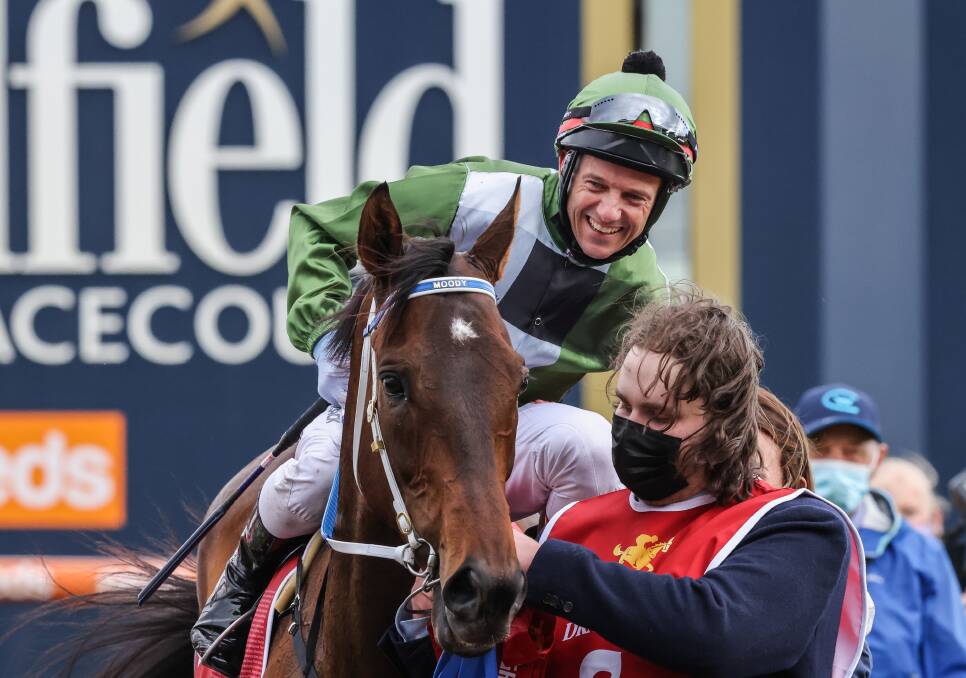 EDGE OF HISTORY: Brett Prebble returns to the mounting yard after winning the Caulfield Cup. Picture: George Sal/Racing Photos