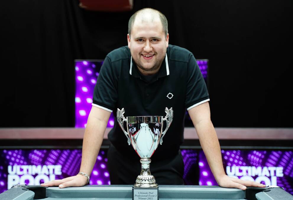 WINNERS ARE GRINNERS: Jake McCartney celebrates his Pro Event 2 win. Picture: Ultimate Pool Series