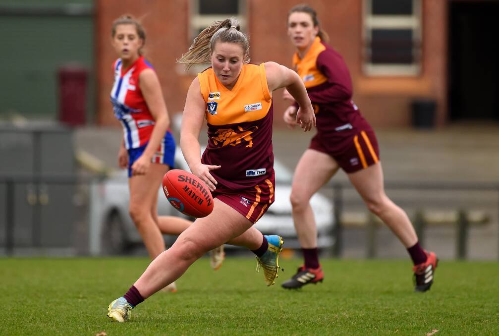Redan's Georgie Hassell chases down the loose ball in 2019. Picture: Adam Trafford
