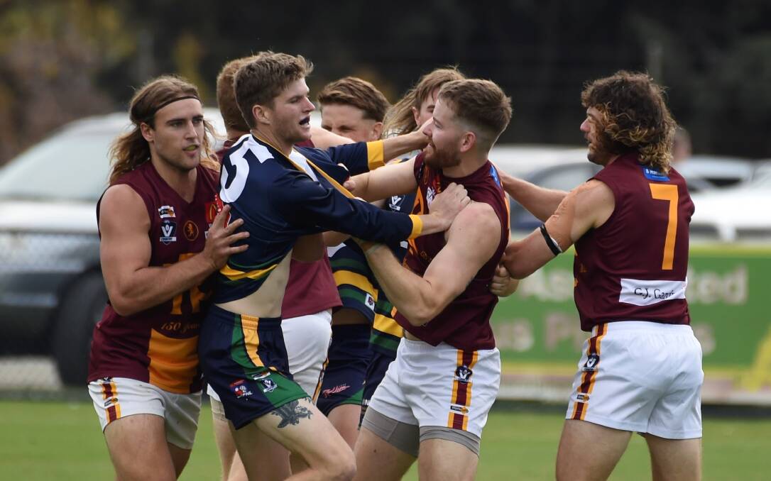 Redan and Lake Wendouree players remonstrate during the Good Friday clash in the 2022 Ballarat Football Netball League season. Picture by Lachlan Bence.